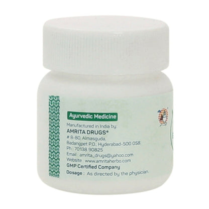 Ayurvedic Amrita Panchamrita Loha Guggul tablets in a blister pack, used for traditional herbal health support.