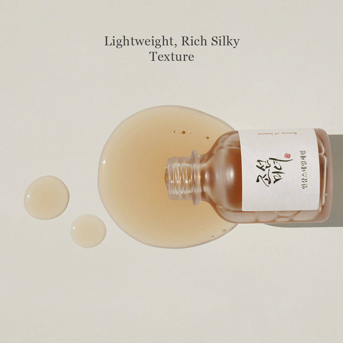 Beauty of Joseon Revive Serum for skin elasticity featuring ginseng and snail mucin, shown in a sleek glass bottle.