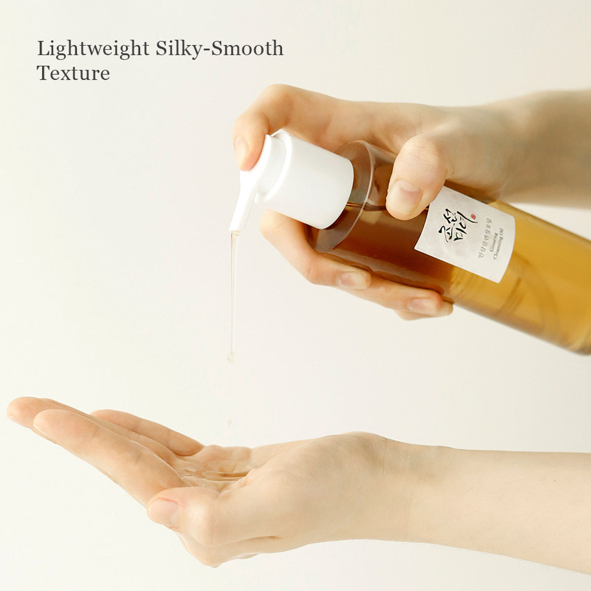 Beauty of Joseon Ginseng Cleansing Oil bottle with pump dispenser, showcasing the skincare product in a clean, minimalist setting.