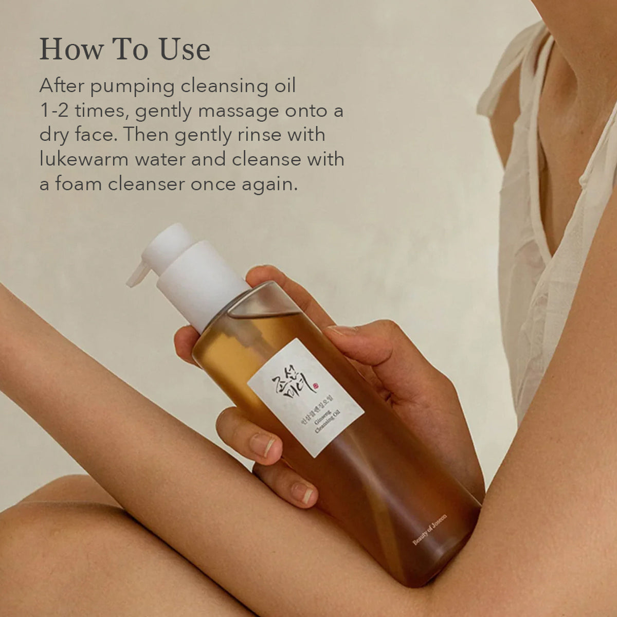 Beauty of Joseon Ginseng Cleansing Oil bottle with pump dispenser, highlighting natural ingredients and elegant packaging.