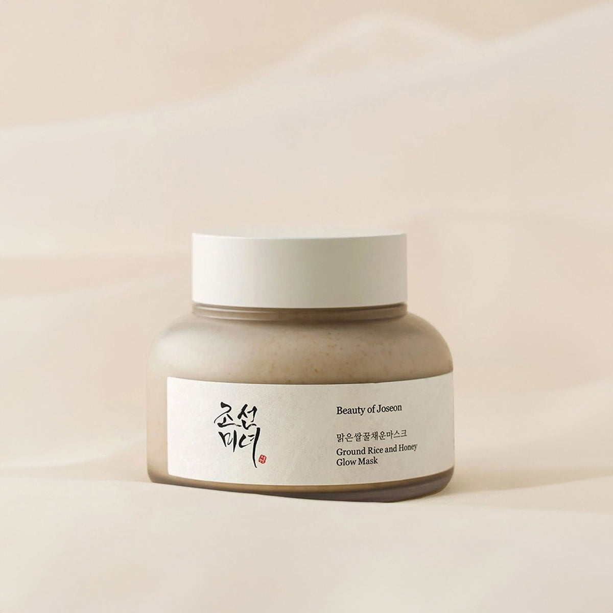 Beauty of Joseon Ground Rice and Honey Glow Mask jar with a white lid and natural ingredients visible on the label