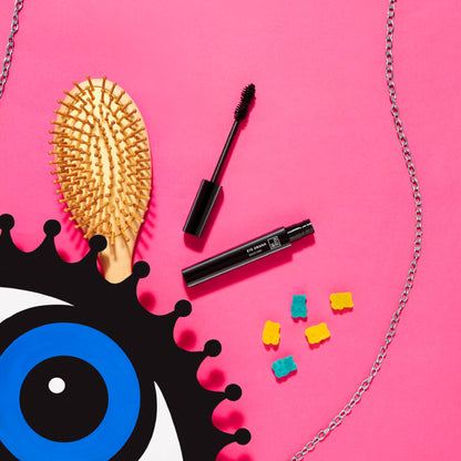 Elle 18 Eye Drama mascara in black, lightweight and volumizing, with water-resistant formula, shown on open eyelash.