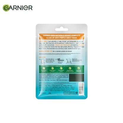 Garnier Bright Complete anti-pimple sheet mask with salicylic acid, niacinamide, and vitamin C serum for clear, glowing skin.