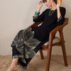Dhiyona IE Floral Printed V-Neck A-Line Kurta With Trousers