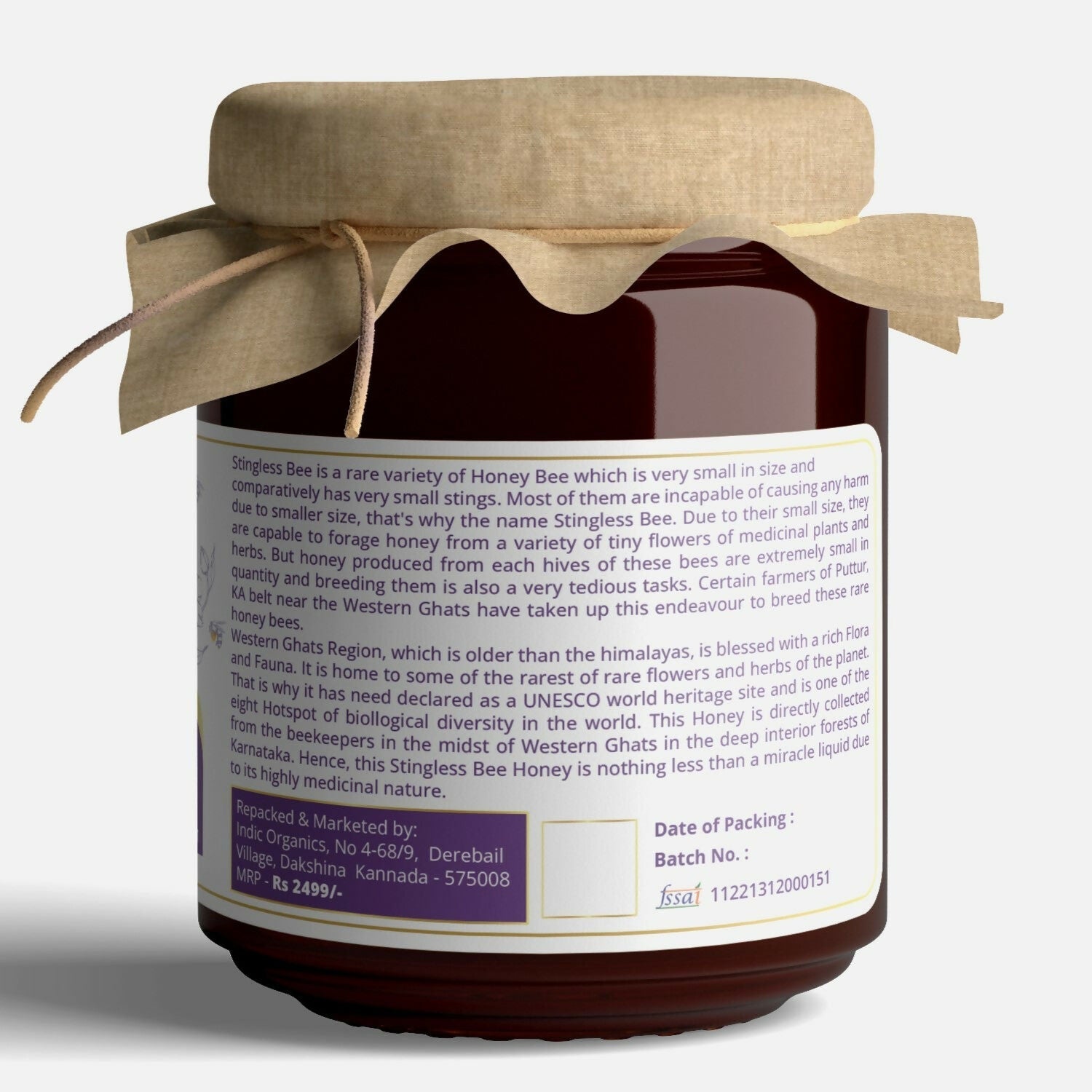 Small jar of Indic Organics Stingless Bee Raw Honey from Western Ghats, used as a spread or natural sweetener.