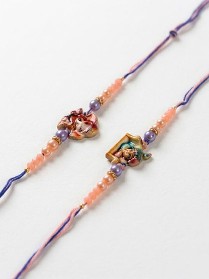 Anouk Set Of 2 Krishna Ji & Ganesh Ji Beaded Religious Thread Rakhi With Roli Chawal