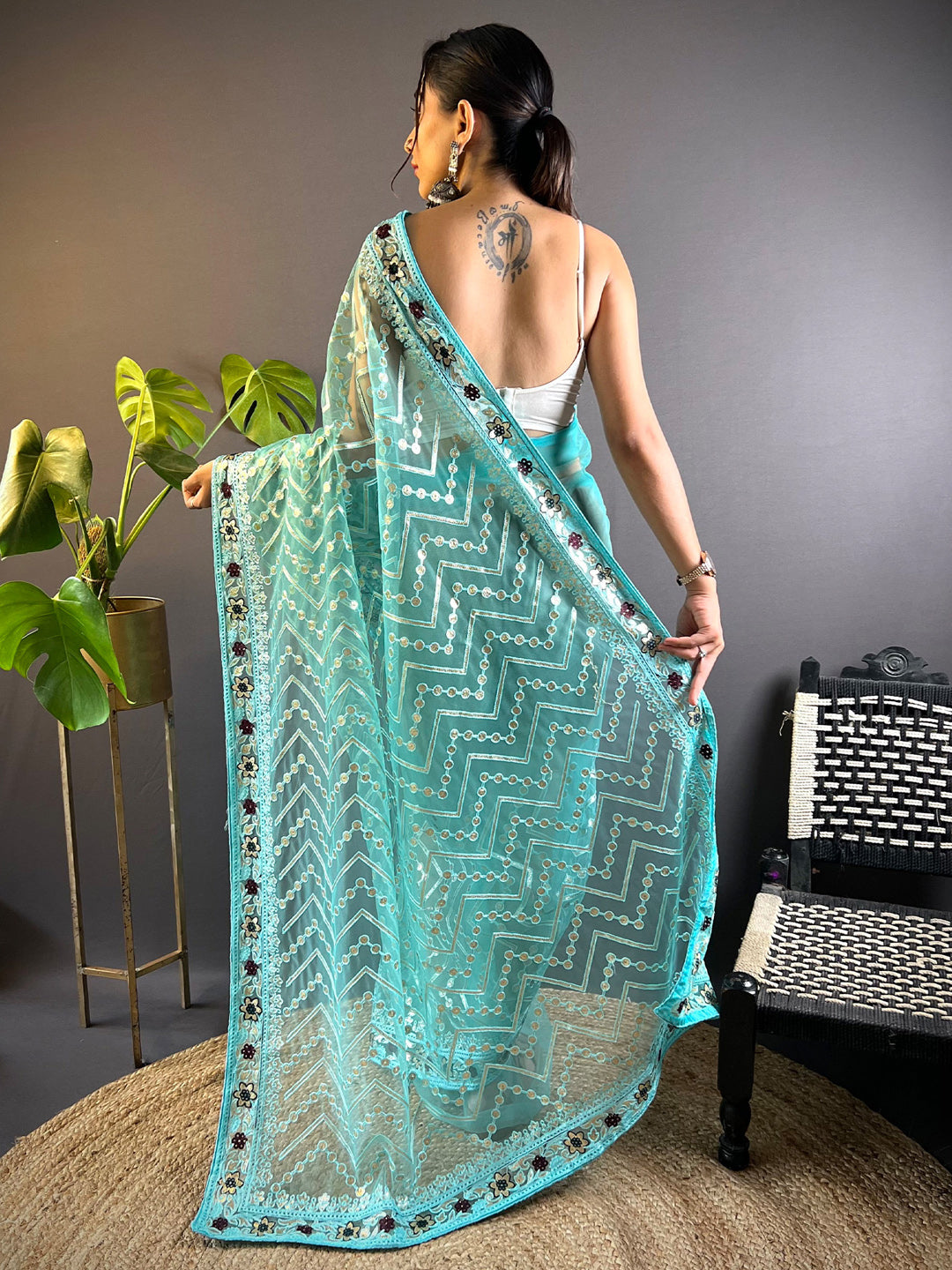 Women's Net Light Blue Embellished Designer Saree With Blouse Piece
