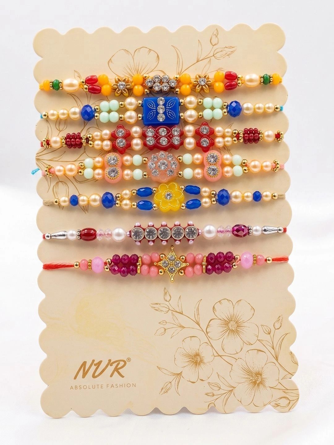 Anouk Set Of 7 Multicolor Designer Thread Rakhi With Roli Chawal Chandan Mishri