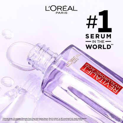 L'Oreal Paris Hydrated, plump and radiant skin kit featuring serums and essence bottles on a white background.