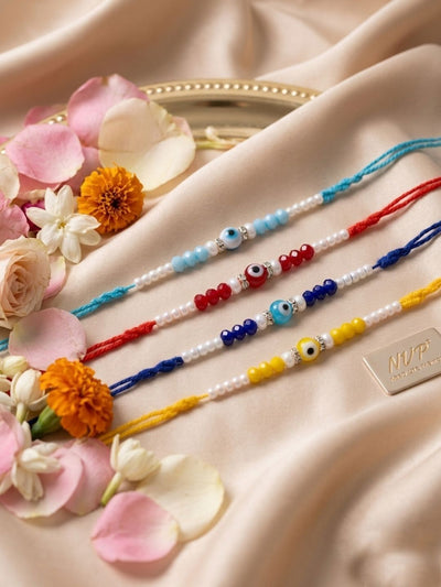Dhiyona Set Of 4 Multicolor Evil Eye Thread Rakhi With Roli Chawal Chandan Mishri