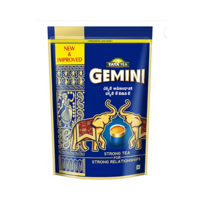 Tata Tea Gemini Strong Assam black tea powder in a labeled package, showcasing vibrant branding and tea powder texture.