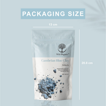 Wild Organic Cambrian Blue Healing Clay Powder for face masks, showing the blue powder in a natural setting.