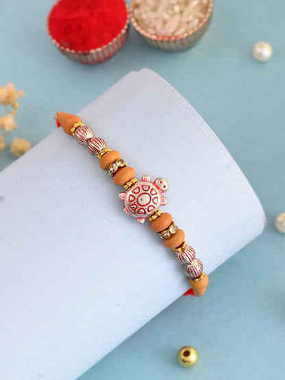 Anouk Red Stone Studded & Beaded Tortoise Charm Thread Rakhi With Roli Chawal