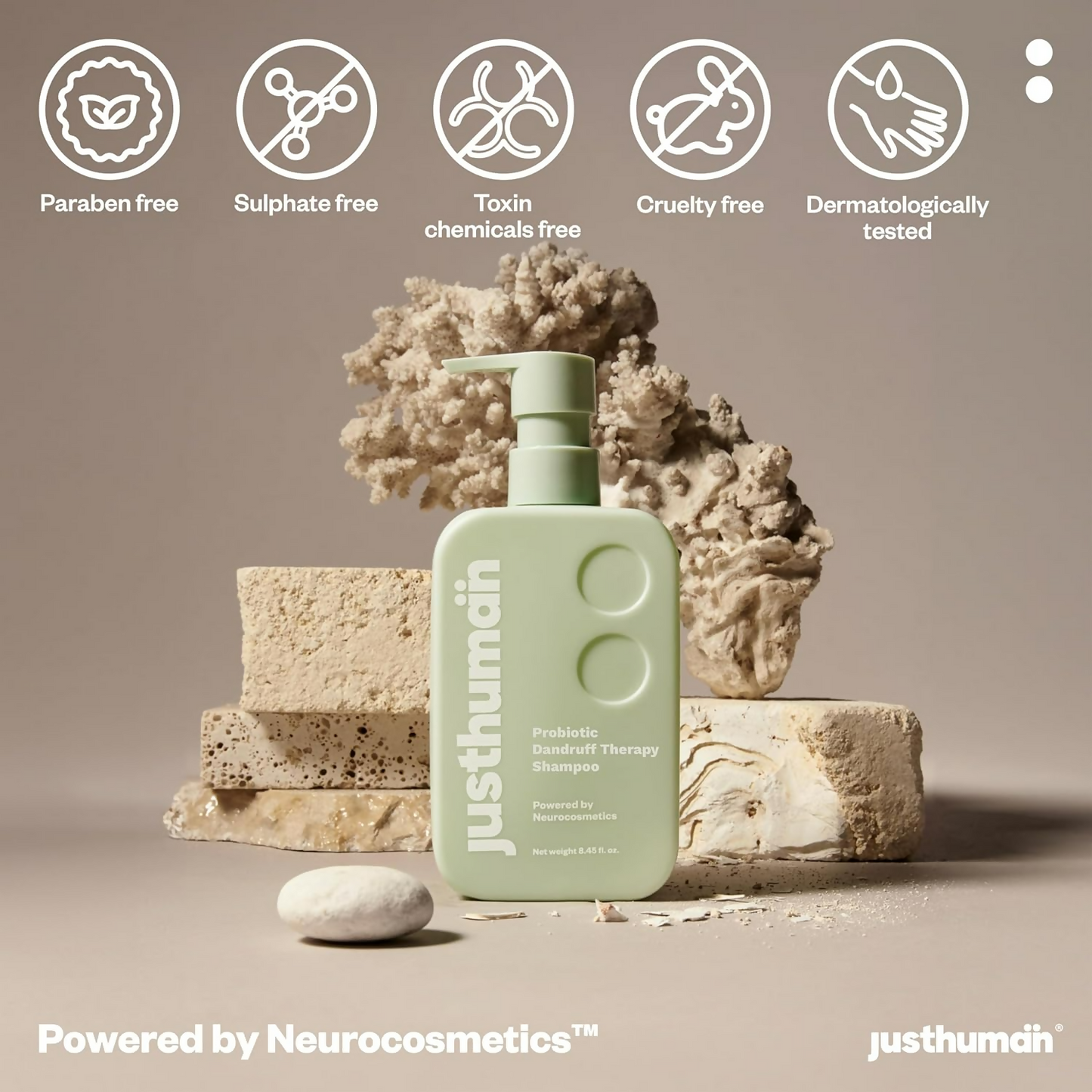 JustHuman Probiotic Anti Dandruff Shampoo bottle, clear label with brand name and product details, placed on a white background.