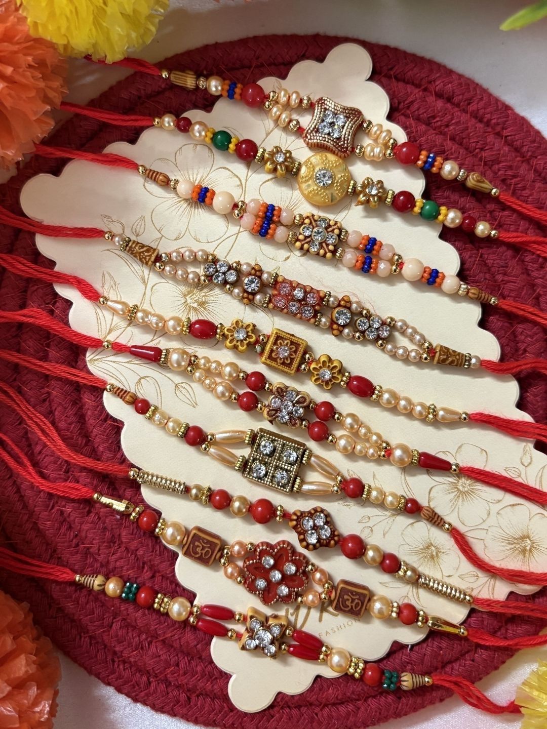 Anouk Set Of 10 Artificial Stones & Beads Thread Rakhi With Roli Chawal Chandan Mishri