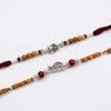 Dhiyona Set Of 2 Silver Toned Religious Rakhi Thread Rakhi Roli Chawal Chandan Mishri
