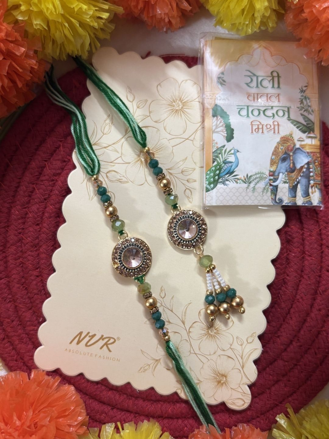 Anouk Set Of 2 Ad Drawstring Bhaiya Bhabhi Rakhi With Roli Chawal Chandan Mishri