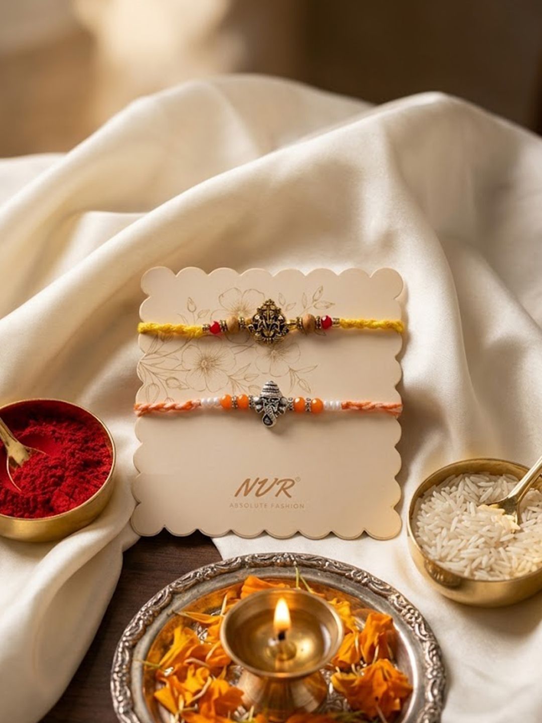 Anouk Set Of 2 Multicolor Religious Thread Rakhi With Roli Chawal Chandan Mishri