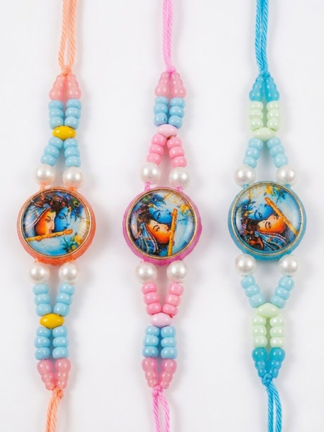 Anouk Set Of 3 Radha Krishna Thread Rakhi With Roli Chawal Chandan Mishri
