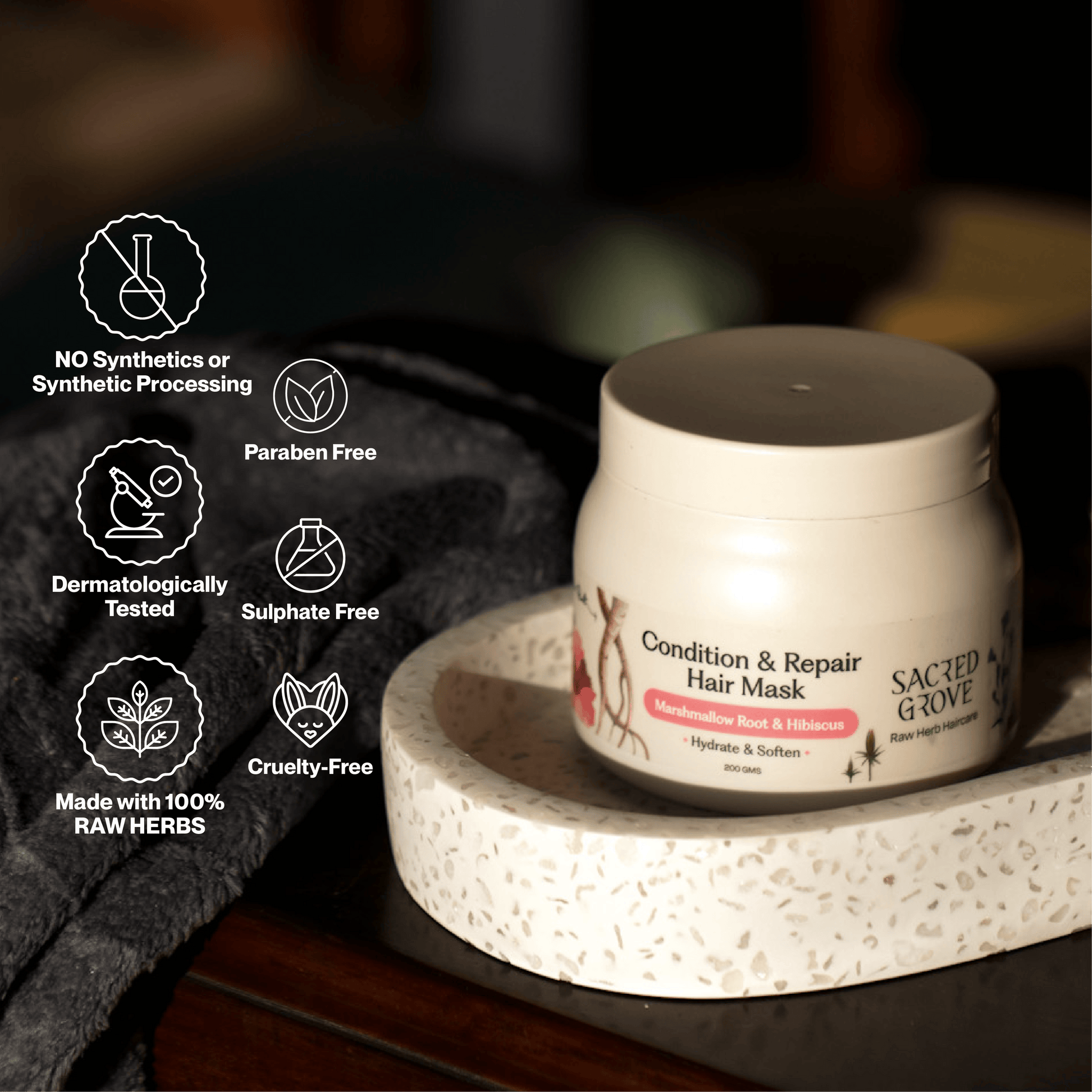 Sacred Grove Marshmallow Root Hair Mask for conditioning and repairing damaged hair, shown in a jar with natural ingredients.