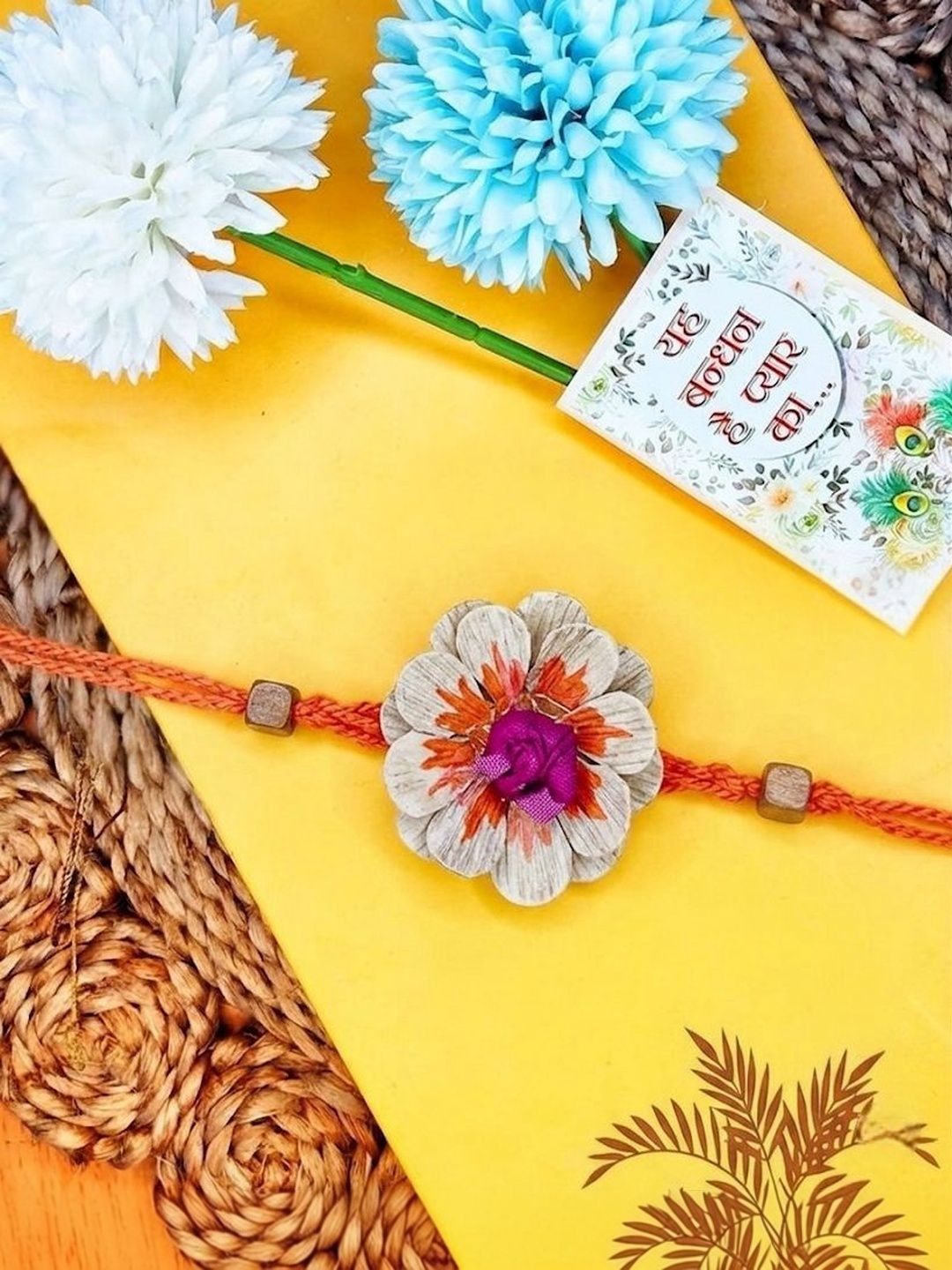 Anouk Multicolor Floral Design Plant Seed Rakhi With Roli Chawal Chandan Mishri