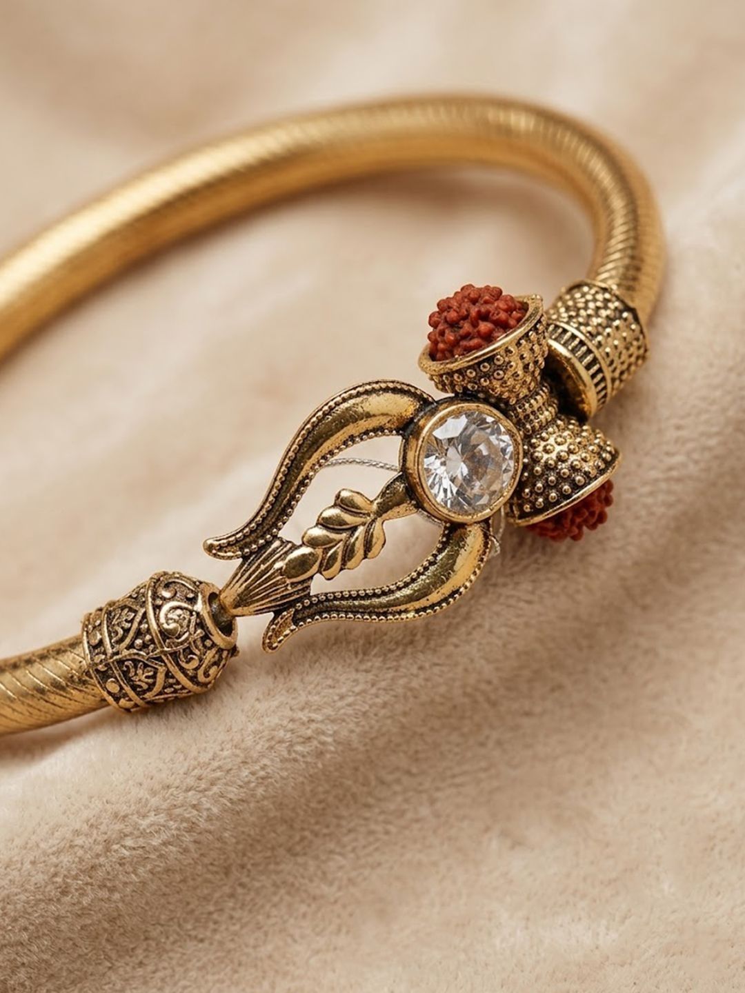 Anouk Gold Plated Trishool Design Rudraksh Rakhi Bracelet With Roli Chawal Chandan Mishri