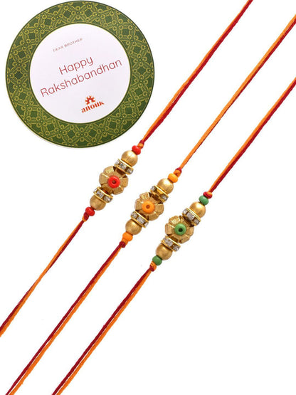 Anouk Set Of 3 Gold-Toned Beaded Rakhi With Roli Rice & Greeting Card