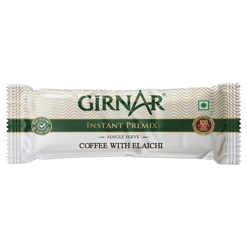 Girnar instant premix coffee with elaichi in a packet, showcasing coffee powder blended with cardamom flavor.