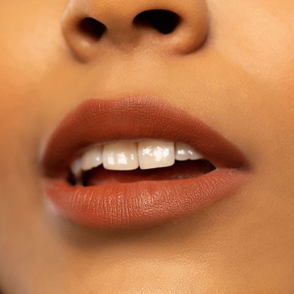 Kay Beauty Matte Drama Long Stay Lipstick in Dialogue, showcasing a rich, matte lipstick shade on a model's lips.