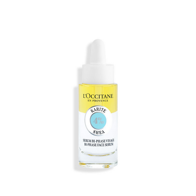 L'Occitane Shea Face Oil with shea butter for nourishing and hydrating skin, featuring a clear glass bottle with dropper.