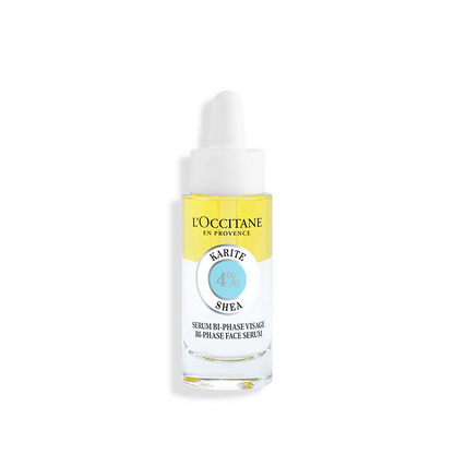 L'Occitane Shea Face Oil with shea butter for nourishing and hydrating skin, featuring a clear glass bottle with dropper.