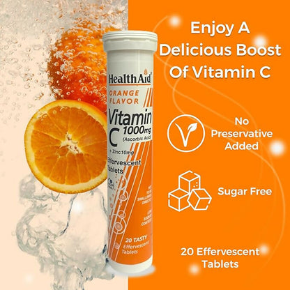 HealthAid Vitamin C 1000mg orange-flavored effervescent tablets with zinc, Ayurvedic health supplement in a glass of dissolved tablet.