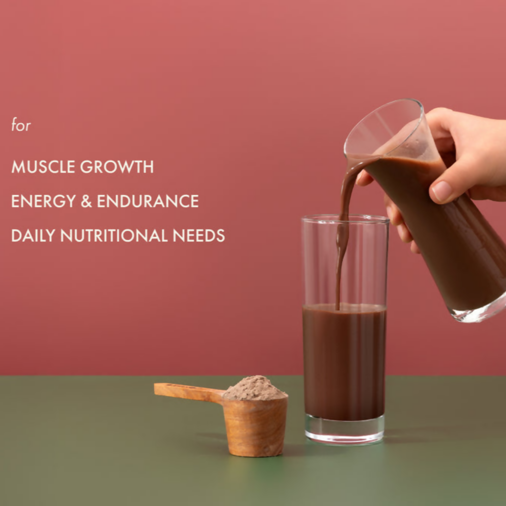 Cosmix No Nonsense Plant Protein Cocoa Beet health drink in a glass with cocoa powder and beets visible, showcasing nutritious ingredients.