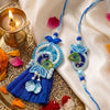 Dhiyona Set Of 2 Peacock Design Bhaiya Bhabhi Rakhi With Roli Chawal Chandan Mishri