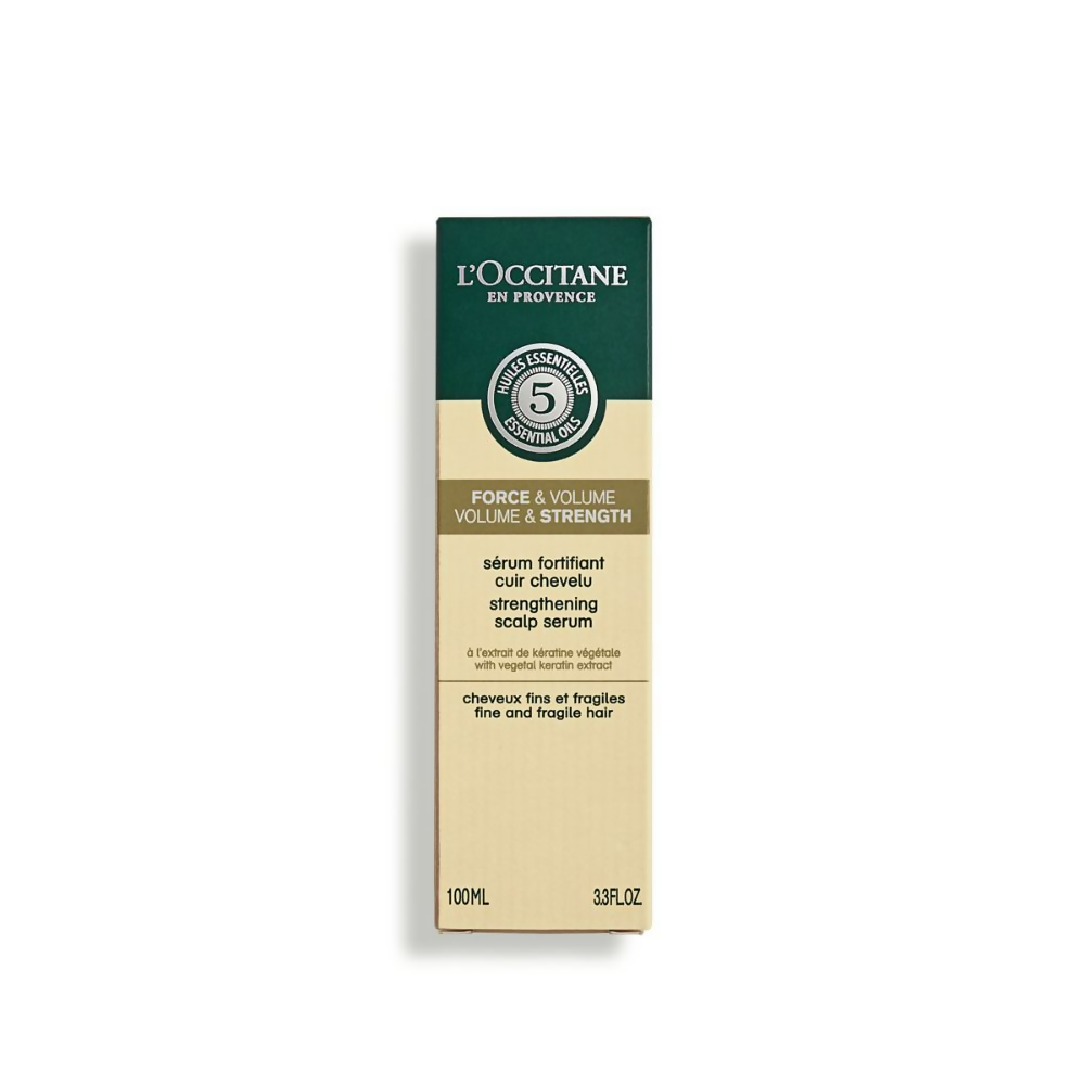 L'Occitane Strength & Volume Scalp Serum bottle with dropper for nourishing hair treatment and scalp care.