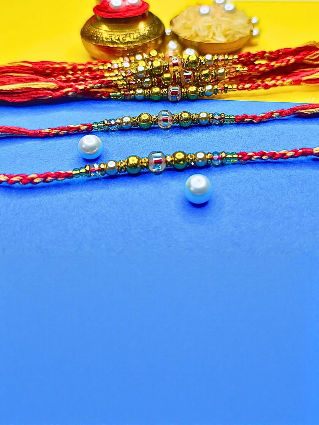 Anouk Thread Set Of 12 Beaded Cotton Thread with AD Stones & Meenakari Designer Rakhi