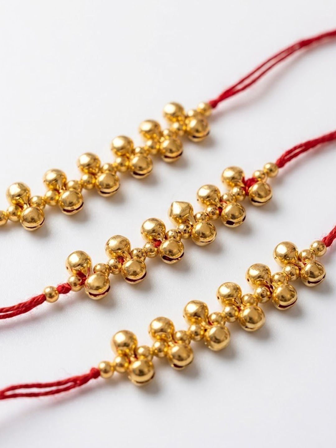 Anouk Set Of 3 Gold Toned Ghungroo & Red Thread Rakhi With Roli Chawal Chandan Mishri