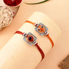 Dhiyona Silver Toned Set Of 2 Beaded Thread Rakhis With Roli Chawal & Greeting Card