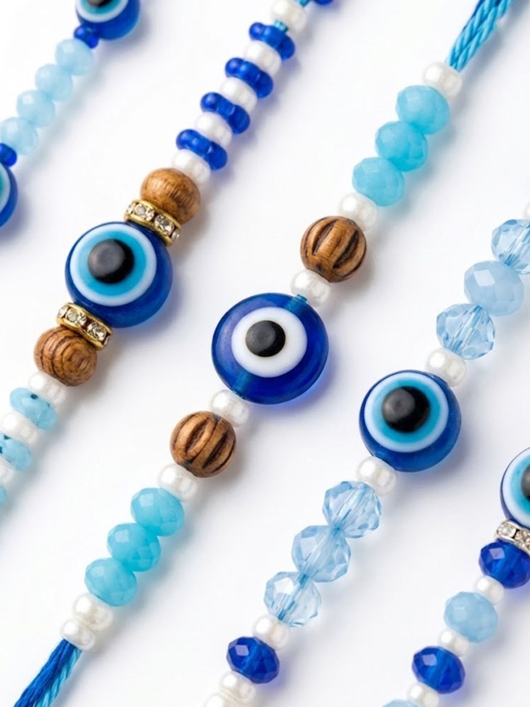 Anouk Set Of 5 Blue Evil Eye Thread Rakhi With Roli Chawal Chandan Mishri