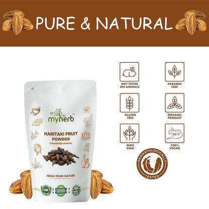 Myherb natural organic haritaki powder in a clear glass jar, showing fine yellowish herbal powder for Ayurvedic use.