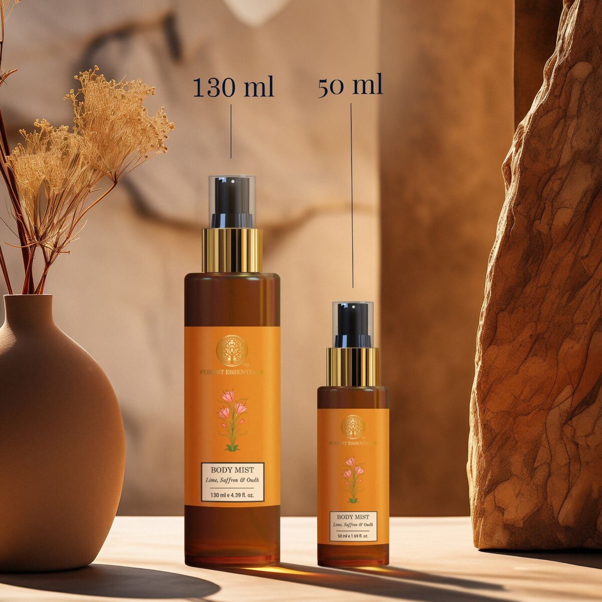 Forest Essentials Lime Saffron & Oudh scented body mist bottle with a floral design, showcasing a luxurious herbal fragrance.