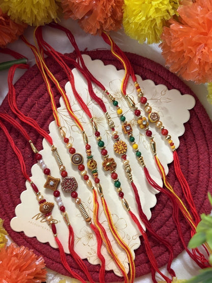 Anouk Set Of 10 Multicolor Designer Thread Rakhi With Roli Chawal Chandan Mishri