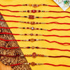 Dhiyona Set Of 10 Multicolor Designer Thread Rakhi With Roli Chawal Chandan Mishri