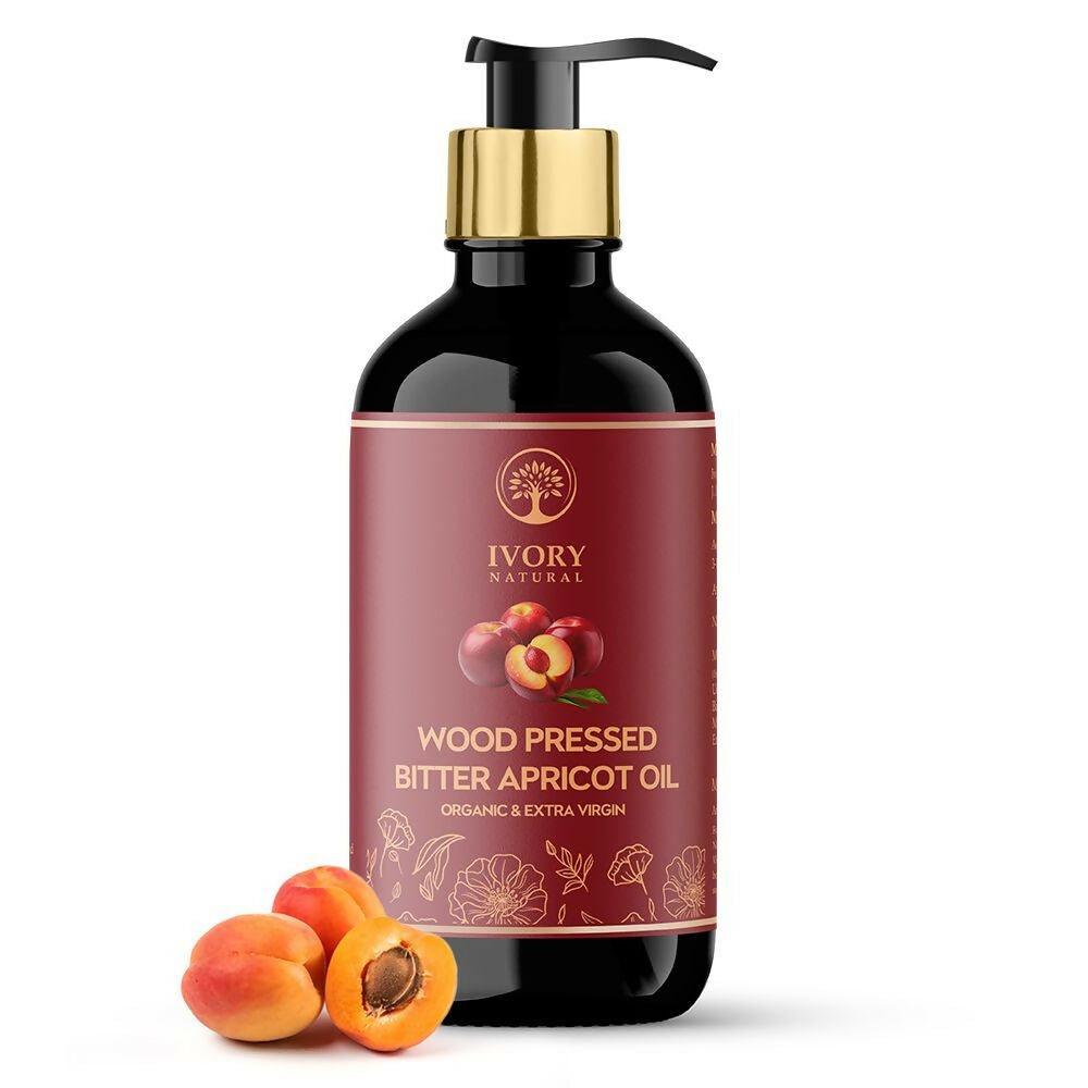 Ivory Natural pressed bitter apricot oil in a glass bottle, showcasing the organic, natural hair oil for deep moisturization and hydration