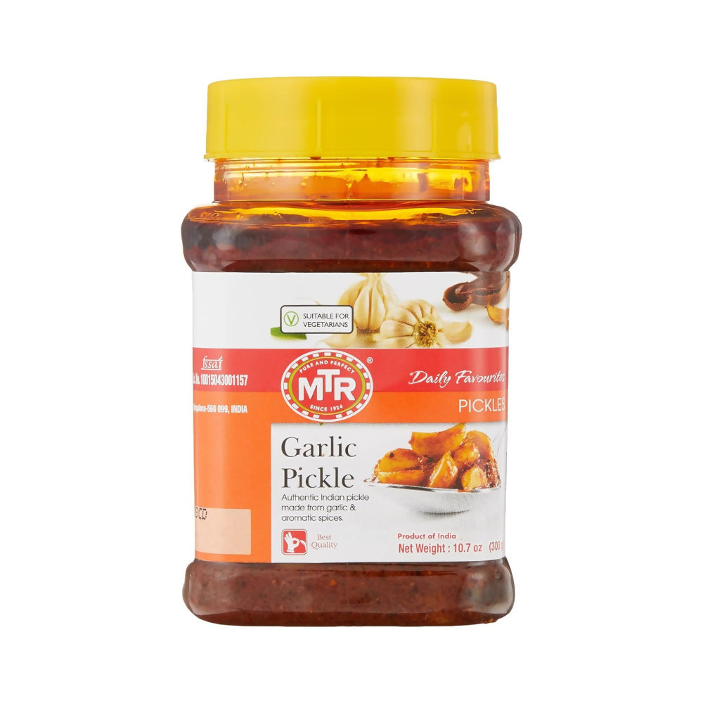 Jar of MTR North Indian Garlic Pickle with chopped garlic and spices inside, showcasing the flavorful pickle.