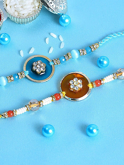 Indyancart Set Of 2 Blue Stones Studded & Beaded Rakhis Comes With Roli Rice & Greeting Card