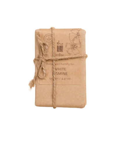 Isha Life White Jasmine Soap bar with floral scent, featuring a smooth, white soap texture in a close-up image.