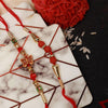 Dhiyona Set Of 4 Stone Studded Rakhi Greeting Card & Roli Chawal