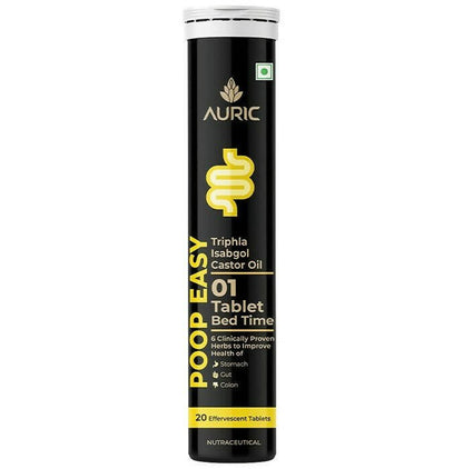 Auric Poop Easy Ayurvedic effervescent tablets in a glass with tablets and a natural herbal background