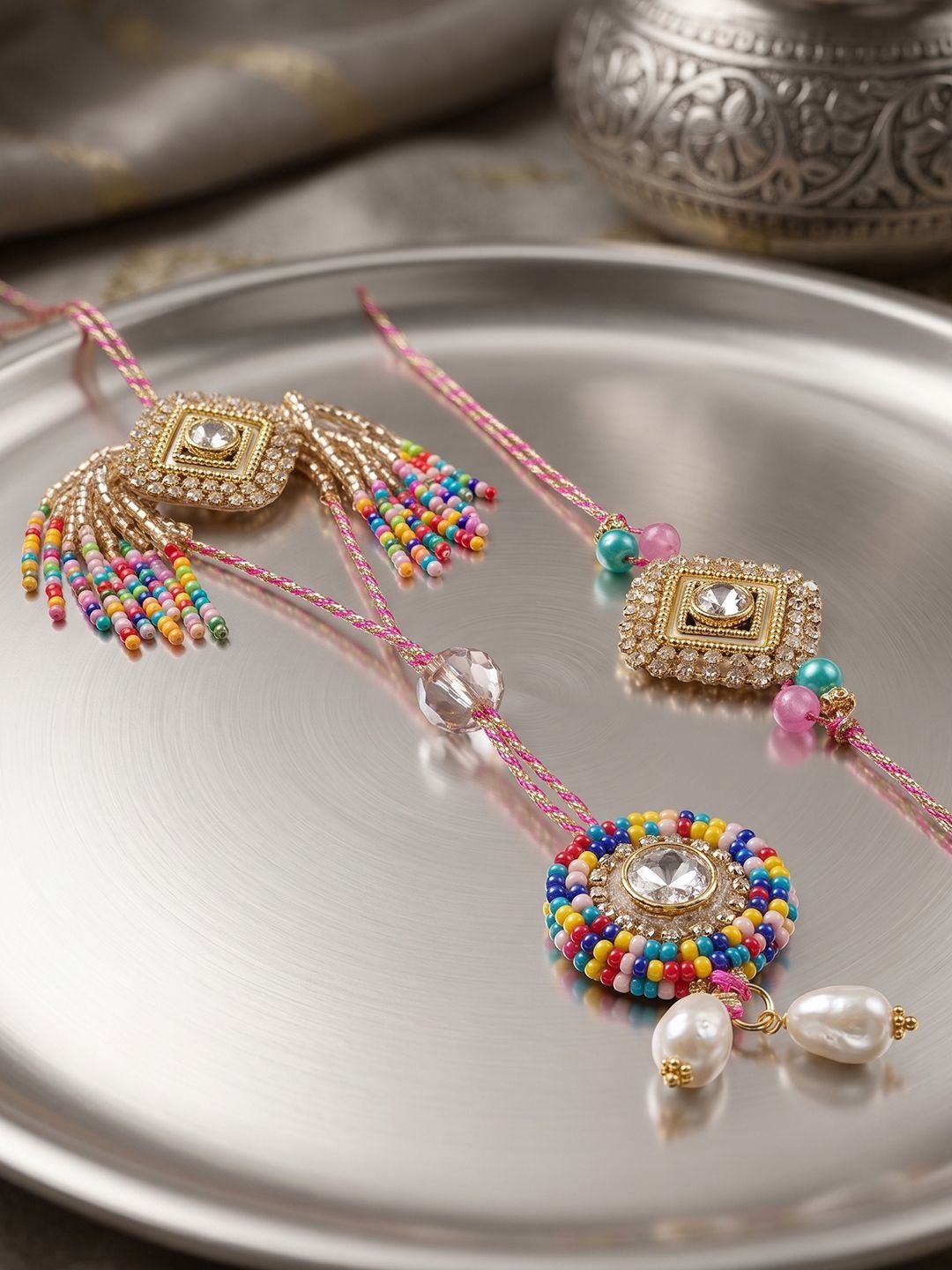 Anouk Set Of 2 White Artificial Stones Golden Toned Bhaiya Bhabhi Rakhi With Roli Chawal